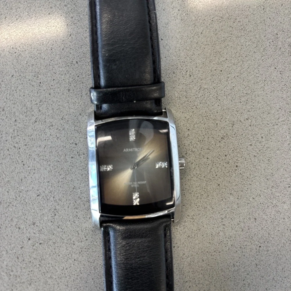 Armitron Men's Genuine Crystal Accented Leather Strap Watch 20/4604BKGPBK‎